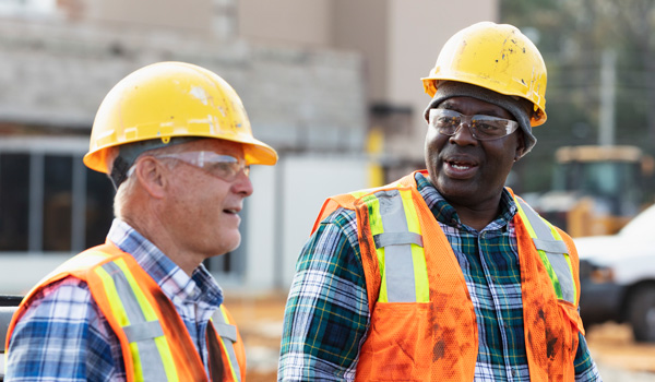 A photo of two construction workers